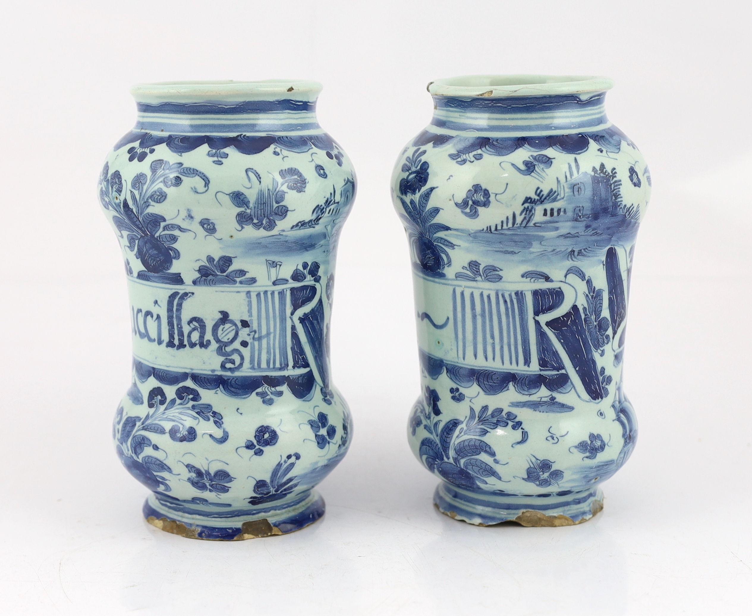 A pair of Italian blue and white maiolica albarellos, Savona, late 17th century, glaze losses, latter chipped